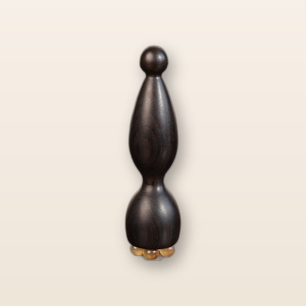 Sandalwood eye massage wand by Glow Ritual