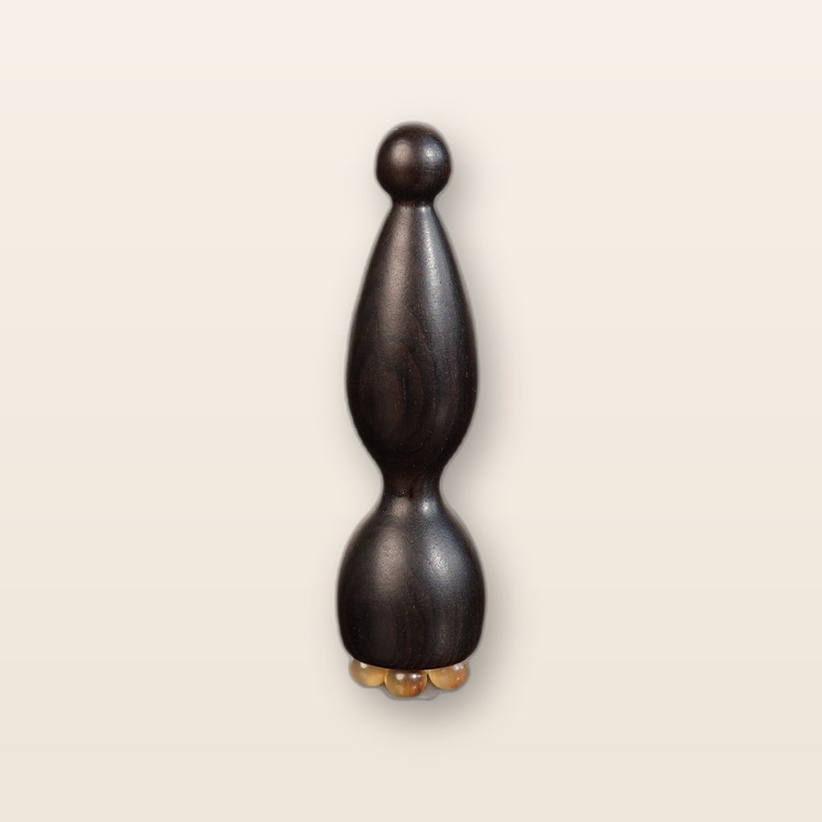 Sandalwood eye massage wand by Glow Ritual