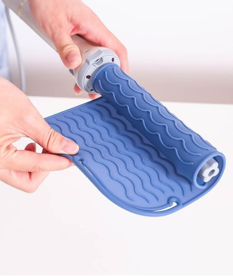Silicone heat-resistant styling mat by Glow Ritual