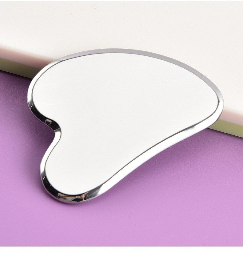 Stainless steel gua sha tool by Glow Ritual