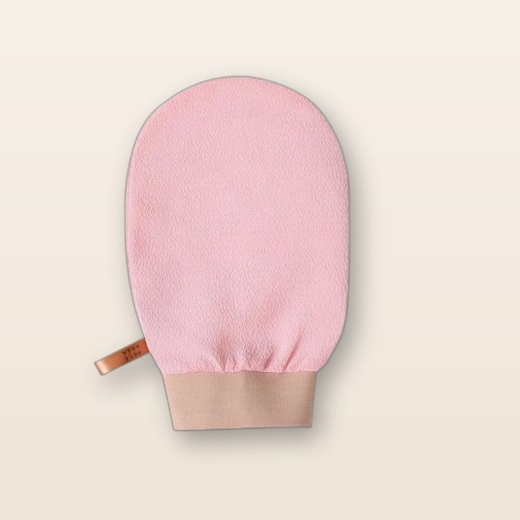 Exfoliating bath glove by Glow Ritual