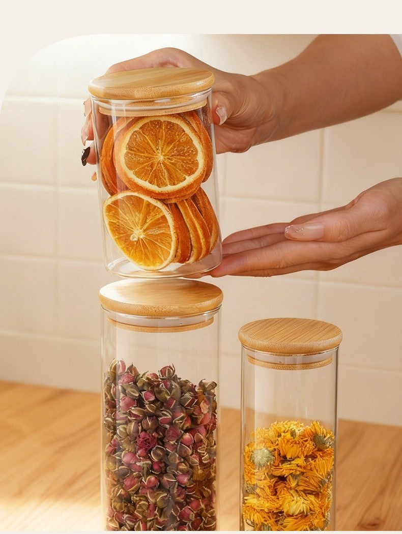 Glass storage jar with bamboo lid by Glow Ritual