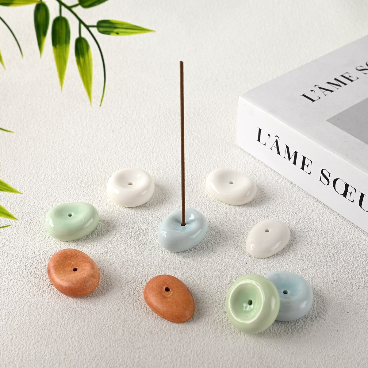 Ceramic pebble incense holder by Glow Ritual