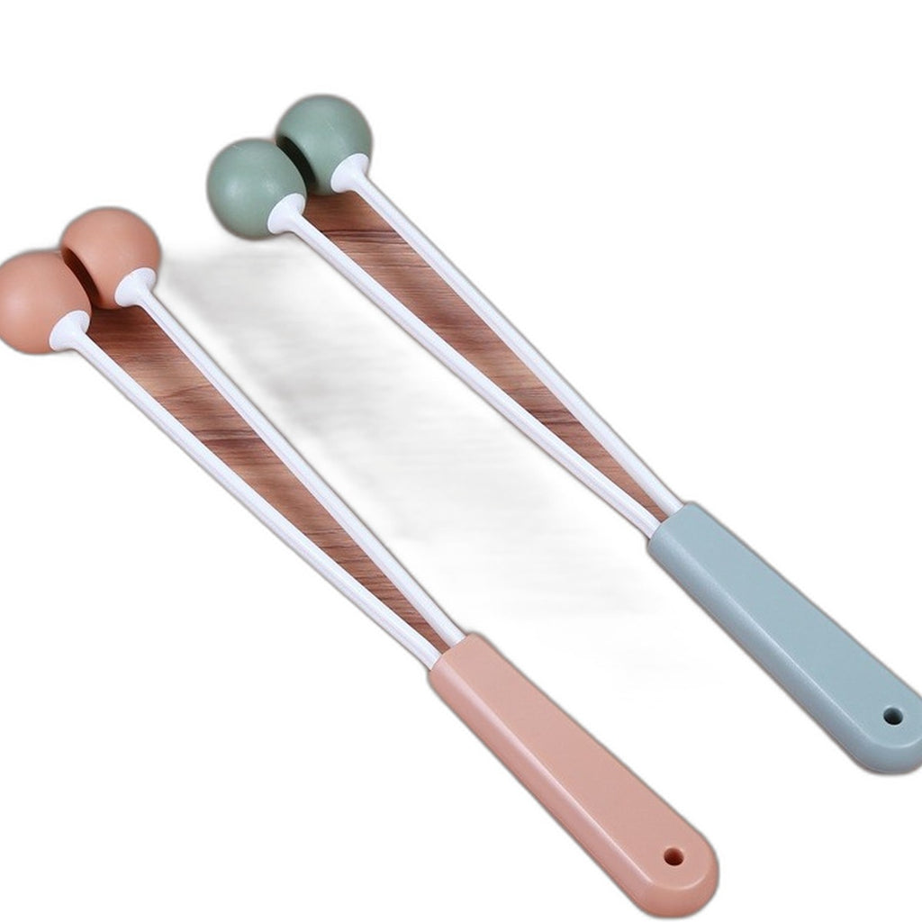 Handheld massage hammer by Glow Ritual