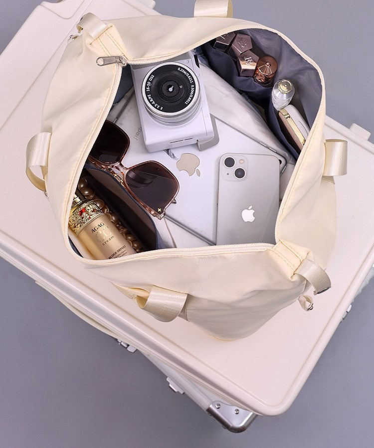 Foldable travel duffel bag by Glow Ritual