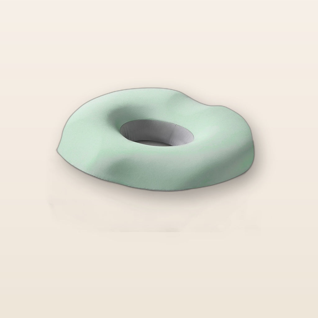 Memory foam donut seat cushion by Glow Ritual