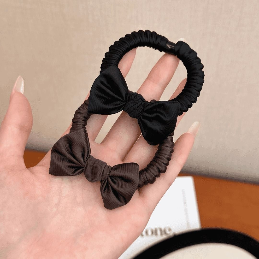 Satin bow scrunchie hair tie by Glow Ritual