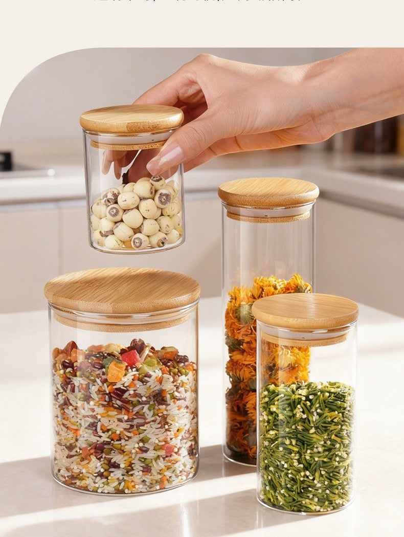 Glass storage jar with bamboo lid by Glow Ritual
