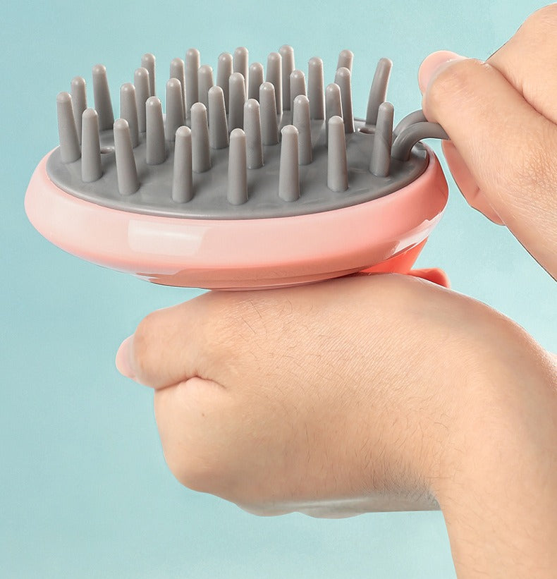 Silicone scalp scrubber shampoo brush by Glow Ritual