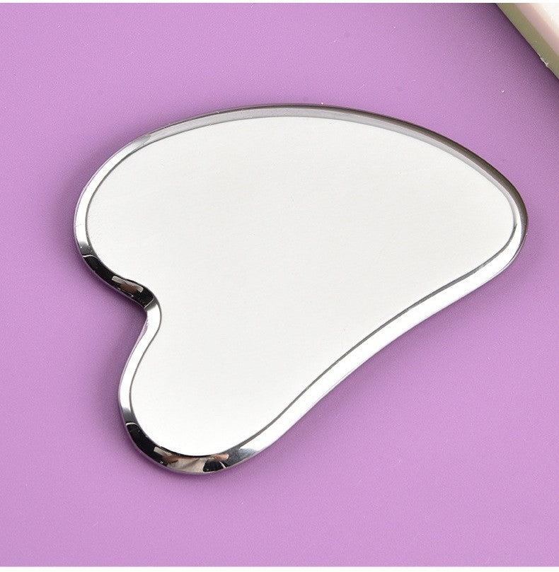 Stainless steel gua sha tool by Glow Ritual