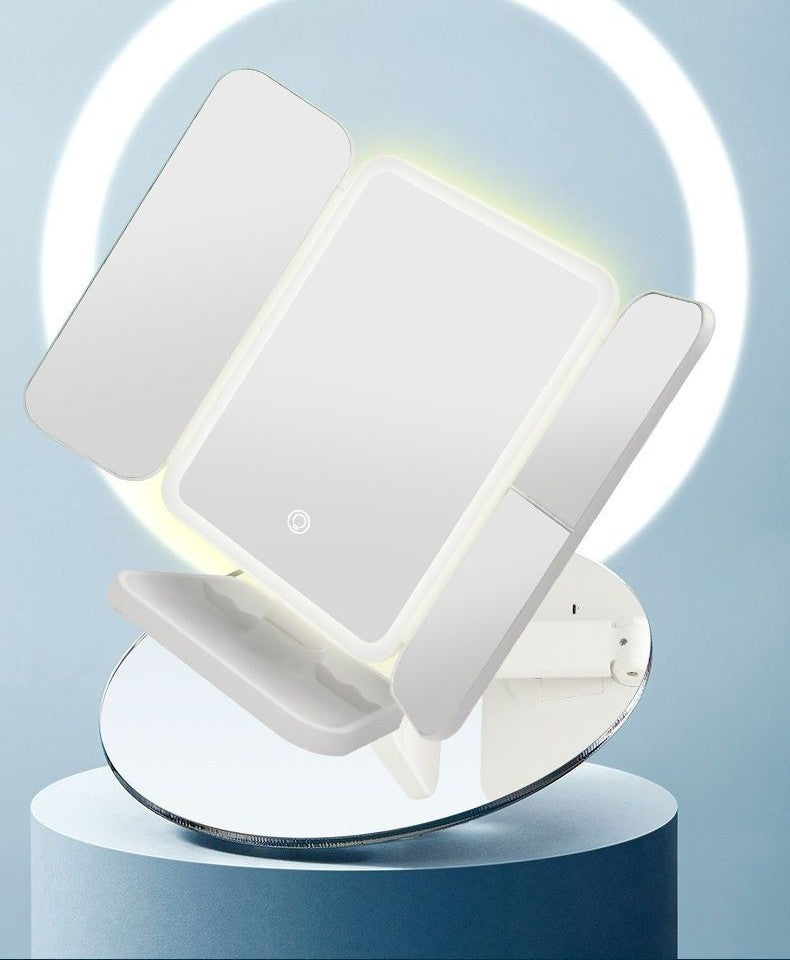 LED lighted tri-fold vanity mirror by Glow Ritual