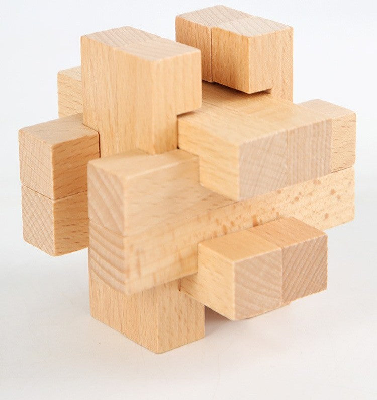 Wooden brain teaser puzzle set by Glow Ritual