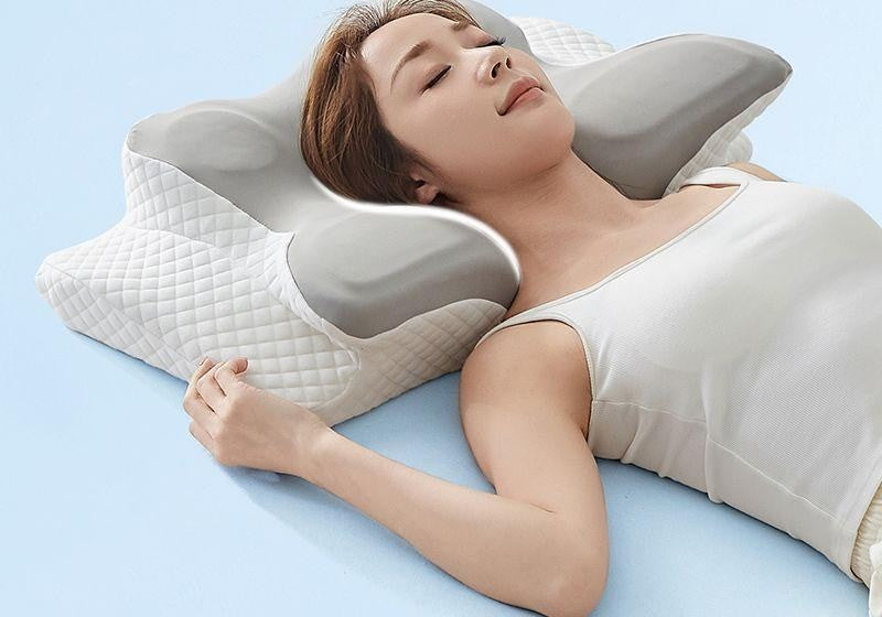 Cervical neck traction pillow by Glow Ritual