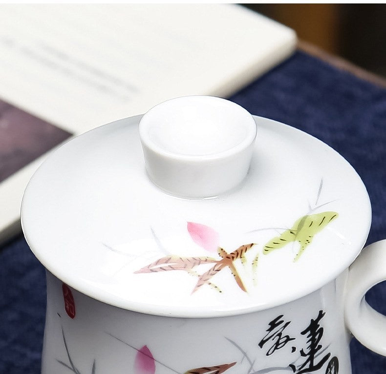 Ceramic tea mug with infuser by Glow Ritual