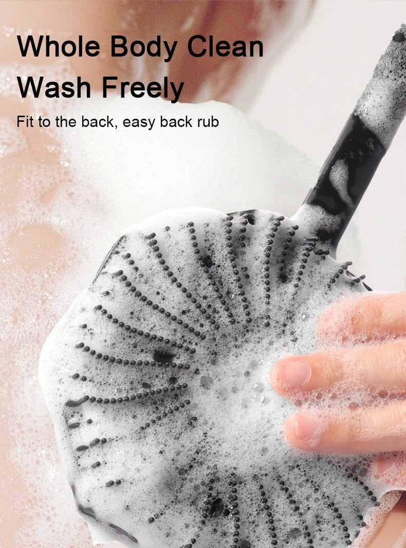 Long-handle silicone body scrubber by Glow Ritual