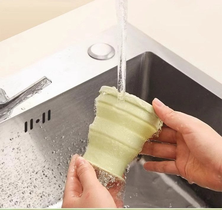 Collapsible silicone travel cup by Glow Ritual