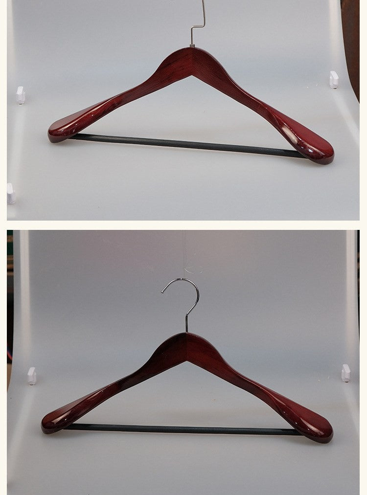 Wide shoulder wooden coat hangers by Glow Ritual