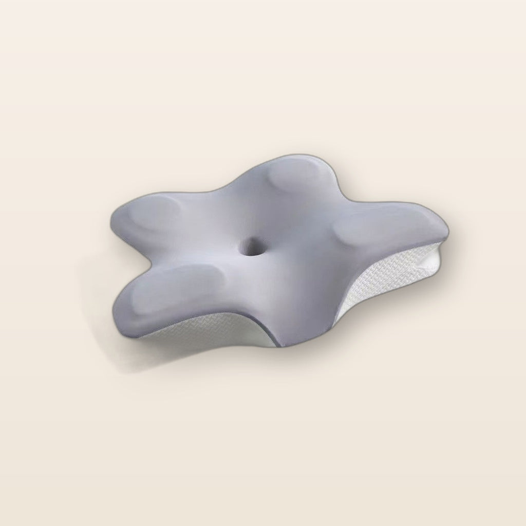 Cervical neck traction pillow by Glow Ritual