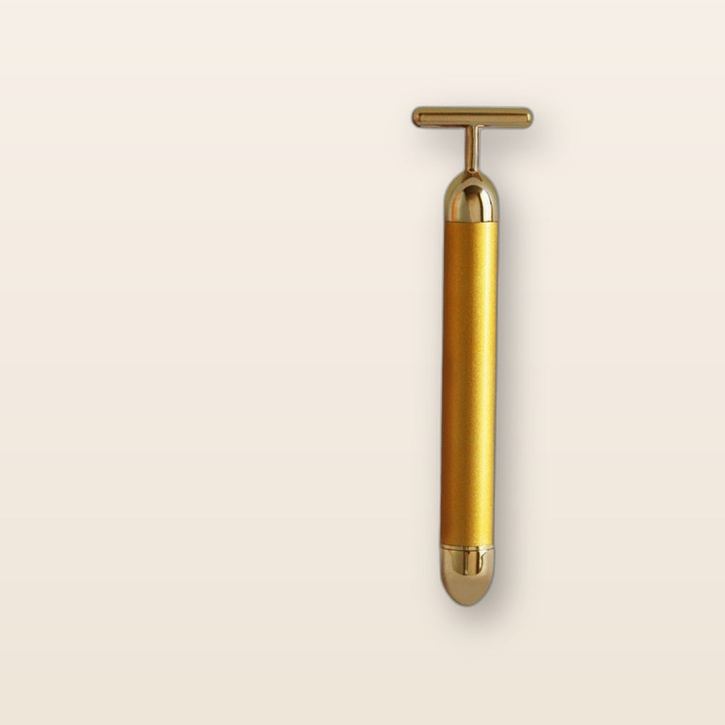 24K gold T-bar face massager by Glow Ritual