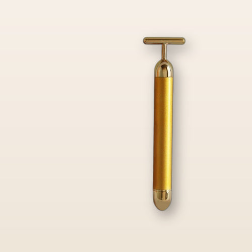 24K gold T-bar face massager by Glow Ritual