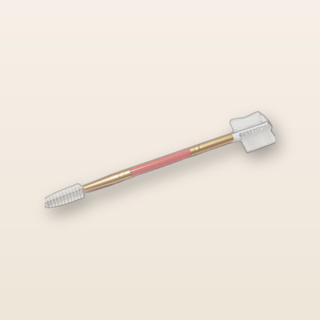 Dual-ended eyelash and brow comb by Glow Ritual