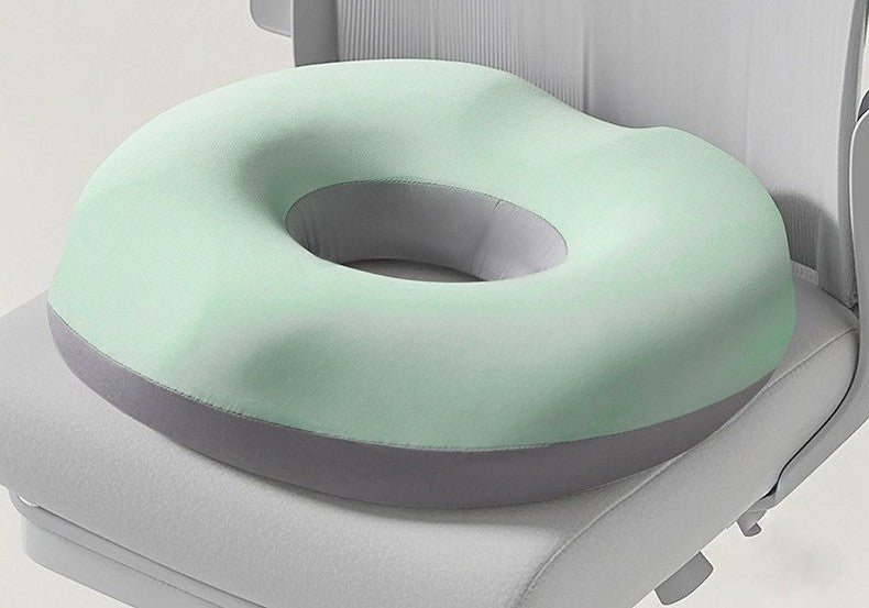 Memory foam donut seat cushion by Glow Ritual