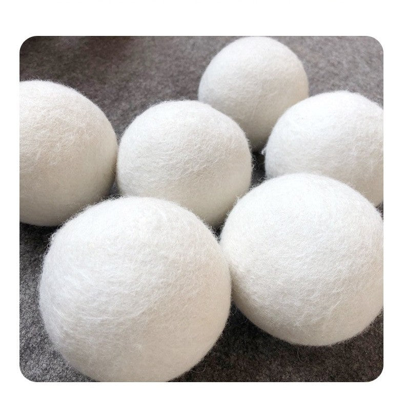 Wool dryer balls by Glow Ritual