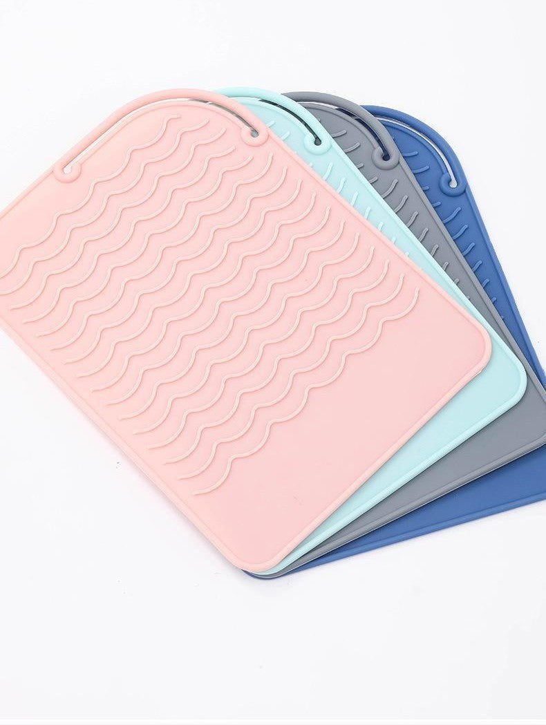 Silicone heat-resistant styling mat by Glow Ritual