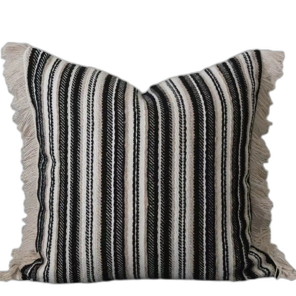 Knit tassel throw pillow by Glow Ritual