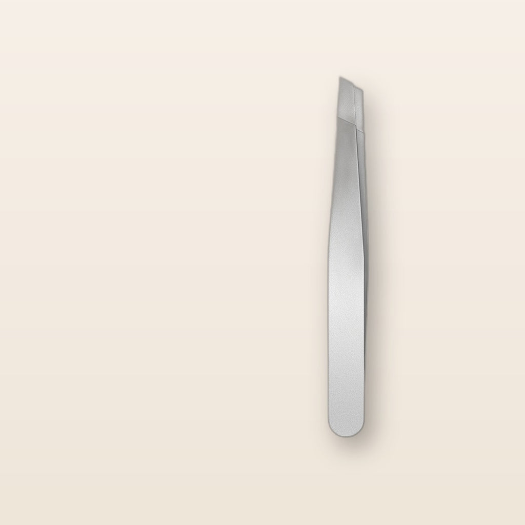 Slant precision eyebrow tweezers by Glow Ritual