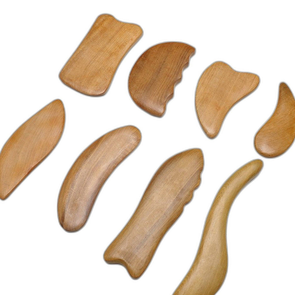 Sandalwood gua sha board by Glow Ritual