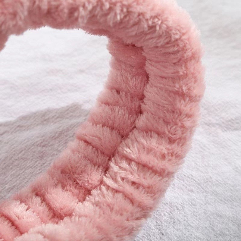 Coral fleece spa headband by Glow Ritual