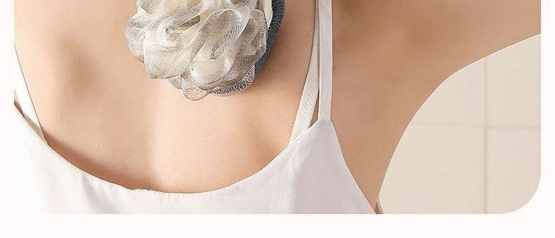 Long-handle back scrubber by Glow Ritual