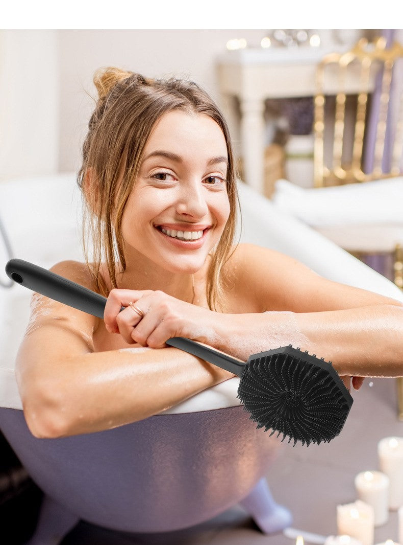 Long-handle silicone body scrubber by Glow Ritual