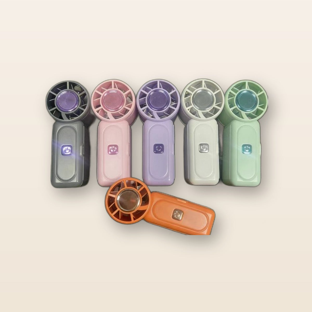 Mini handheld fan by Glow Ritual