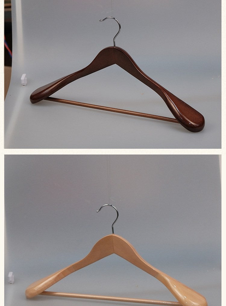 Wide shoulder wooden coat hangers by Glow Ritual