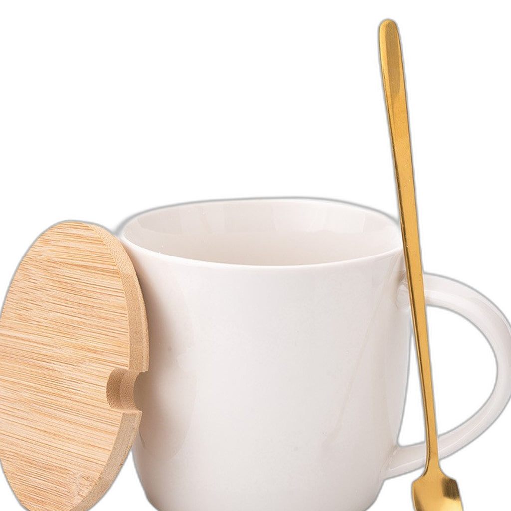 White ceramic mug with lid and spoon by Glow Ritual