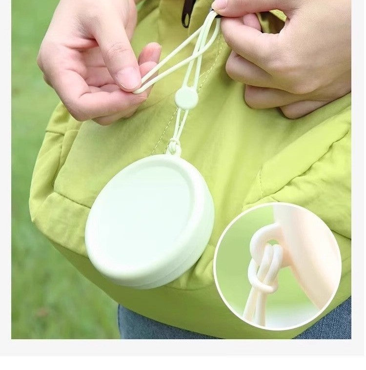Collapsible silicone travel cup by Glow Ritual