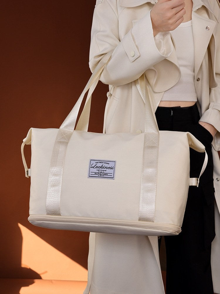 Foldable travel duffel bag by Glow Ritual