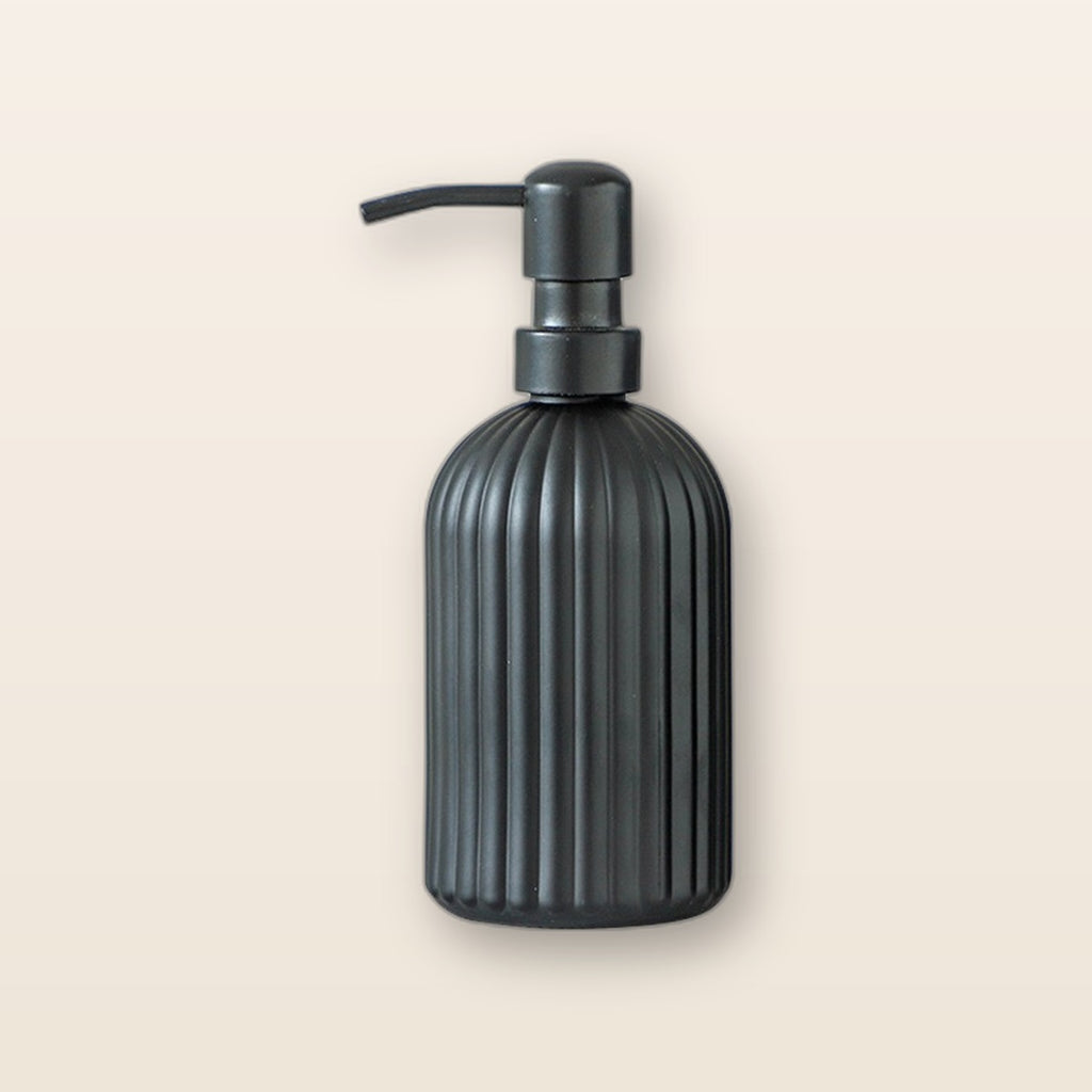 Glass soap dispenser by Glow Ritual