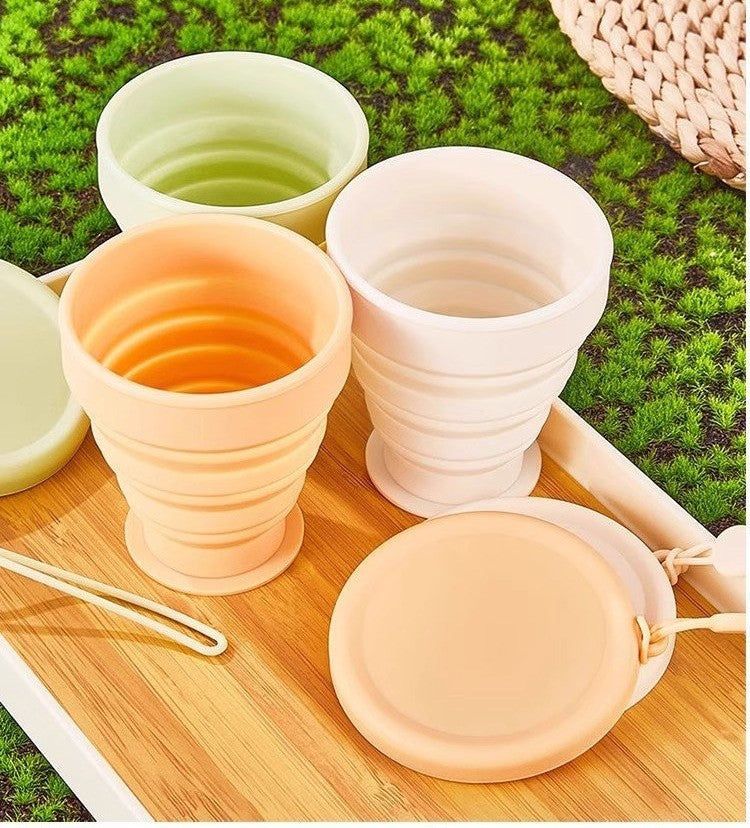 Collapsible silicone travel cup by Glow Ritual