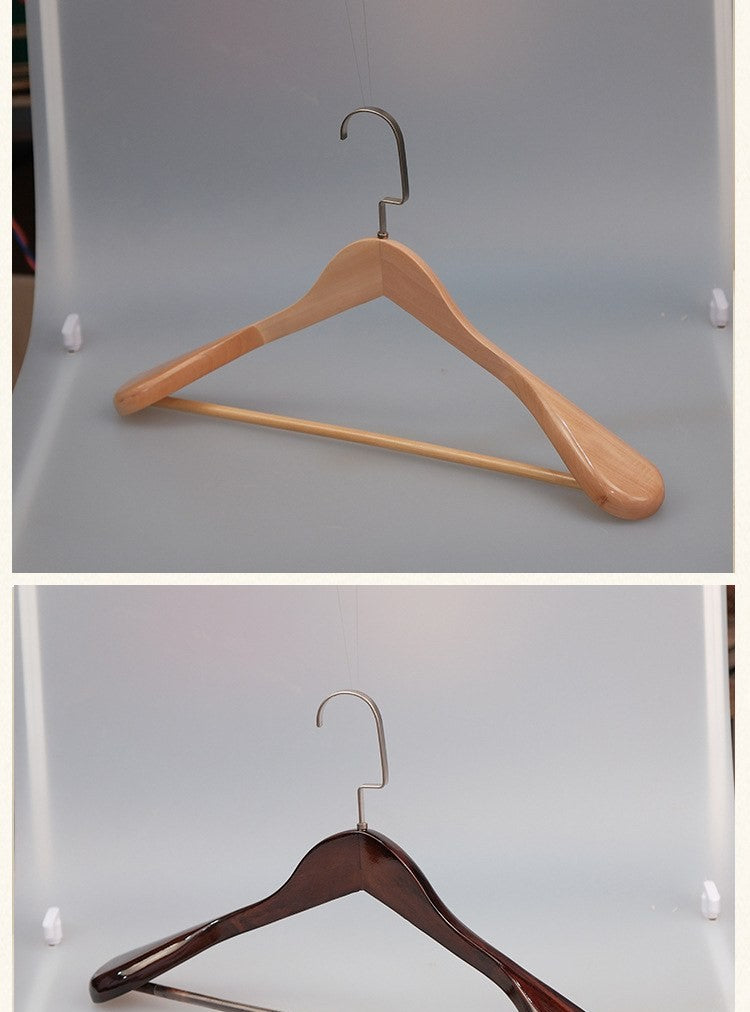 Wide shoulder wooden coat hangers by Glow Ritual