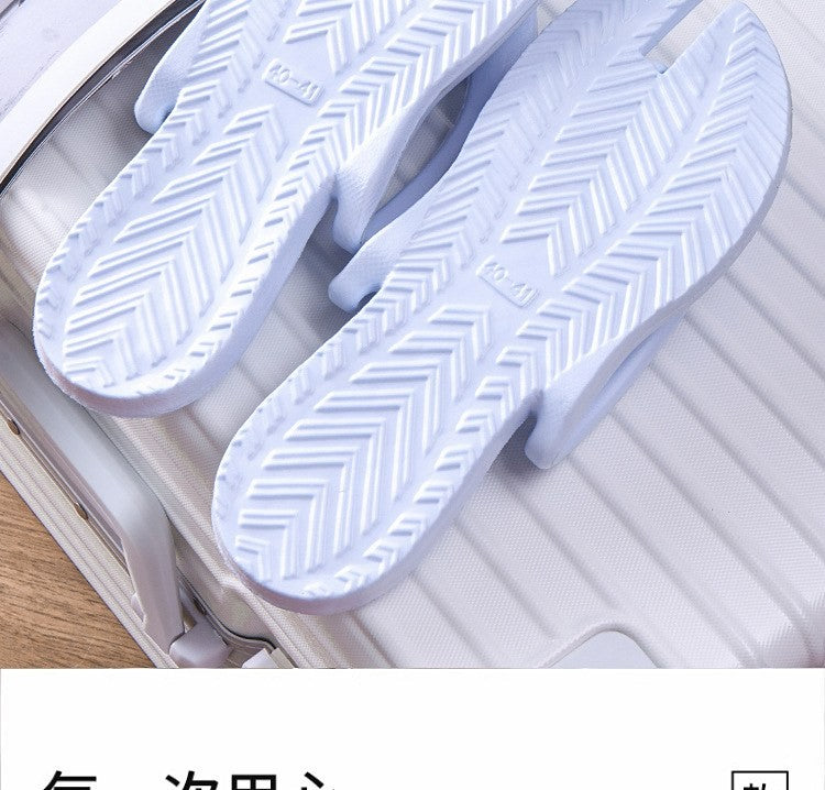 Folding travel slippers by Glow Ritual