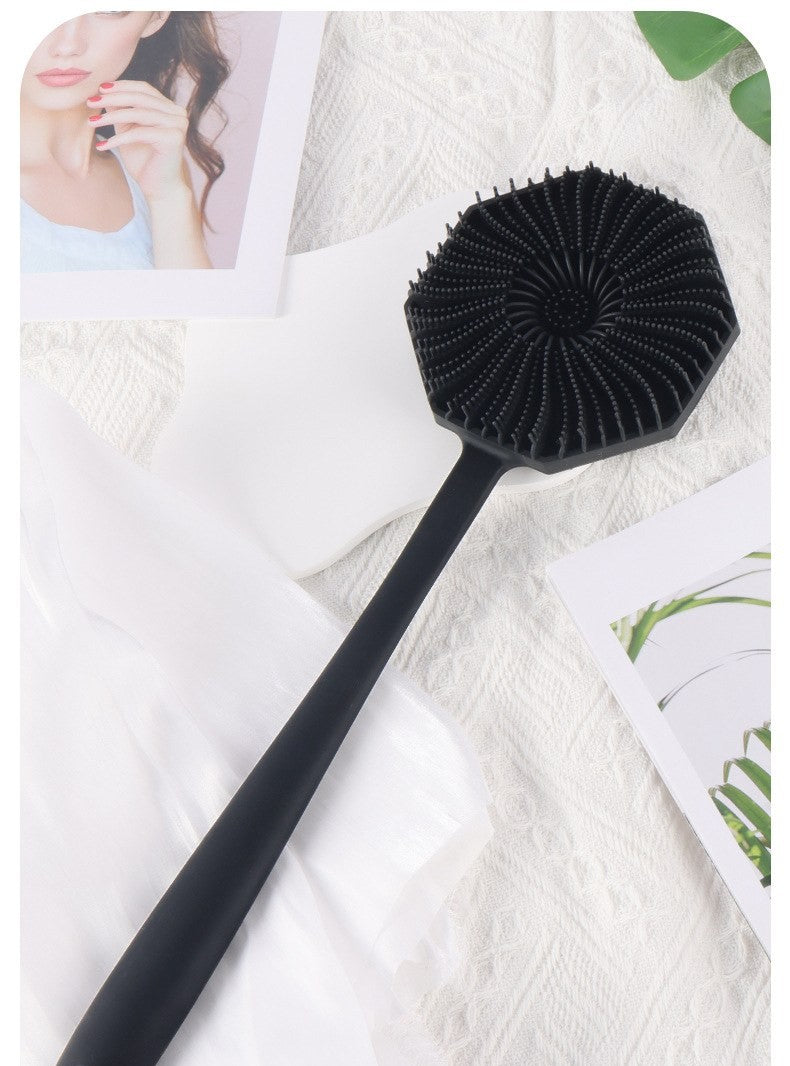Long-handle silicone body scrubber by Glow Ritual