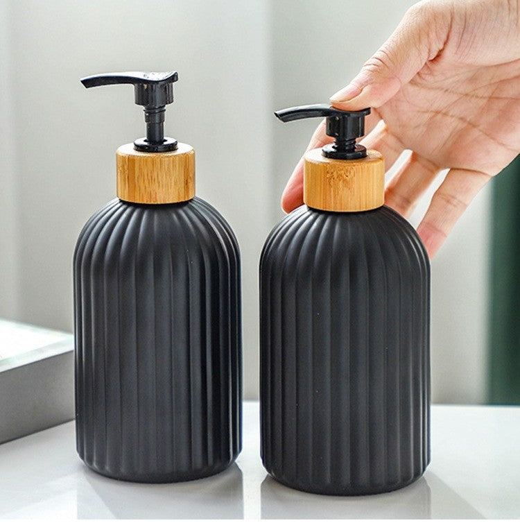 Glass soap dispenser by Glow Ritual
