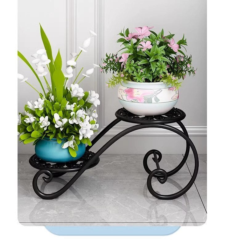 Metal tiered plant stand by Glow Ritual