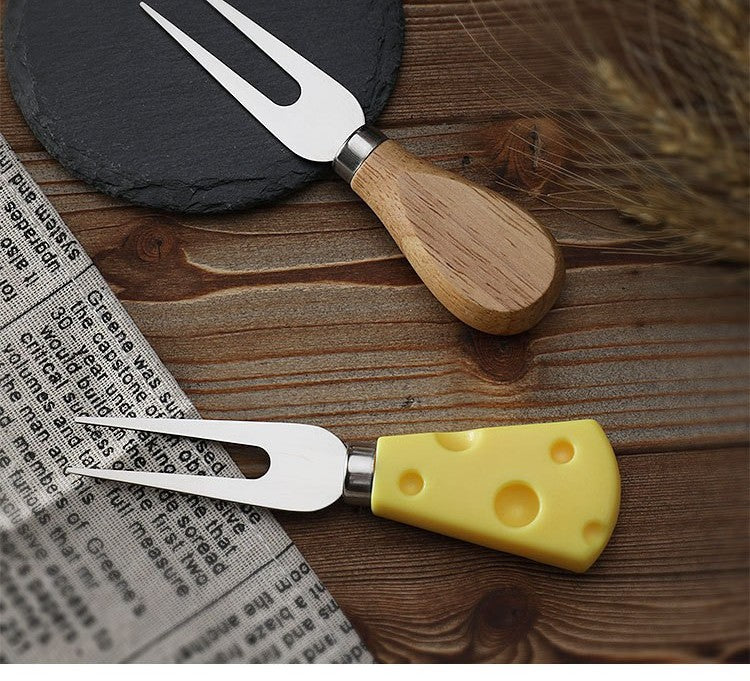 White handle cheese knife by Glow Ritual