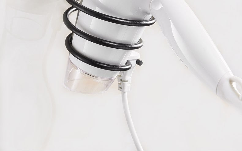 Wall-mounted hair dryer holder by Glow Ritual