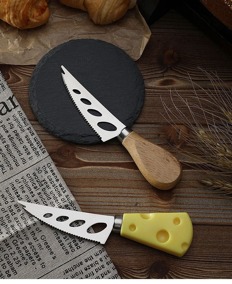 White handle cheese knife by Glow Ritual