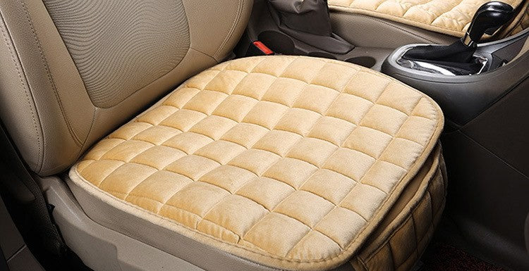 Plush car seat cushion by Glow Ritual